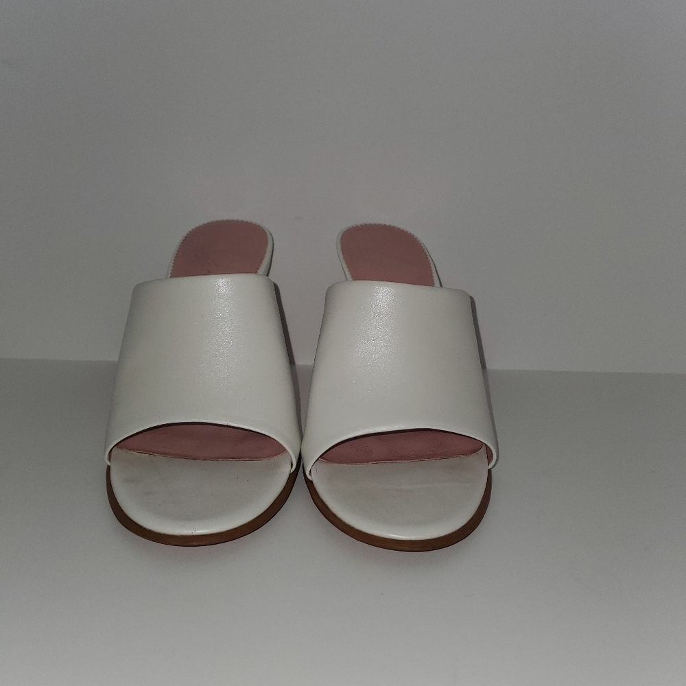 White mule sandels. Approx. 3" heel.